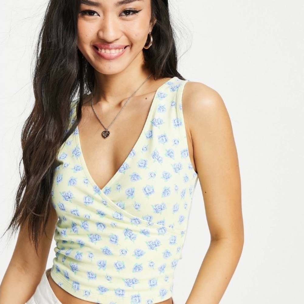 ASOS design sleeveless wrap top in floral ditsy